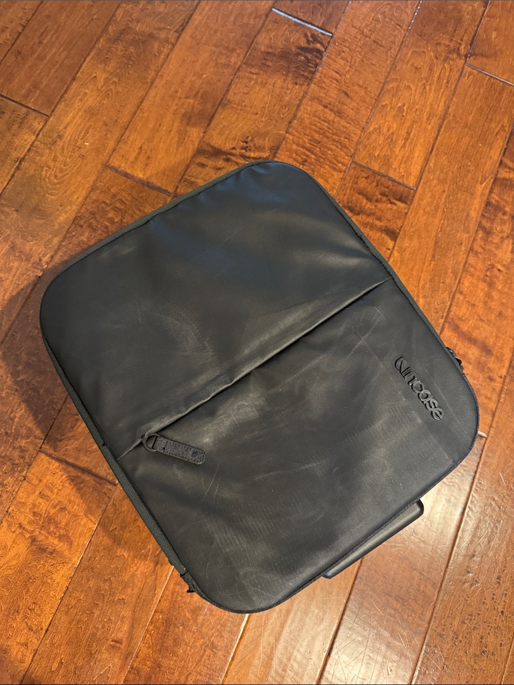 Incase Black rolling carry on suitcase with Laptop Sleeve